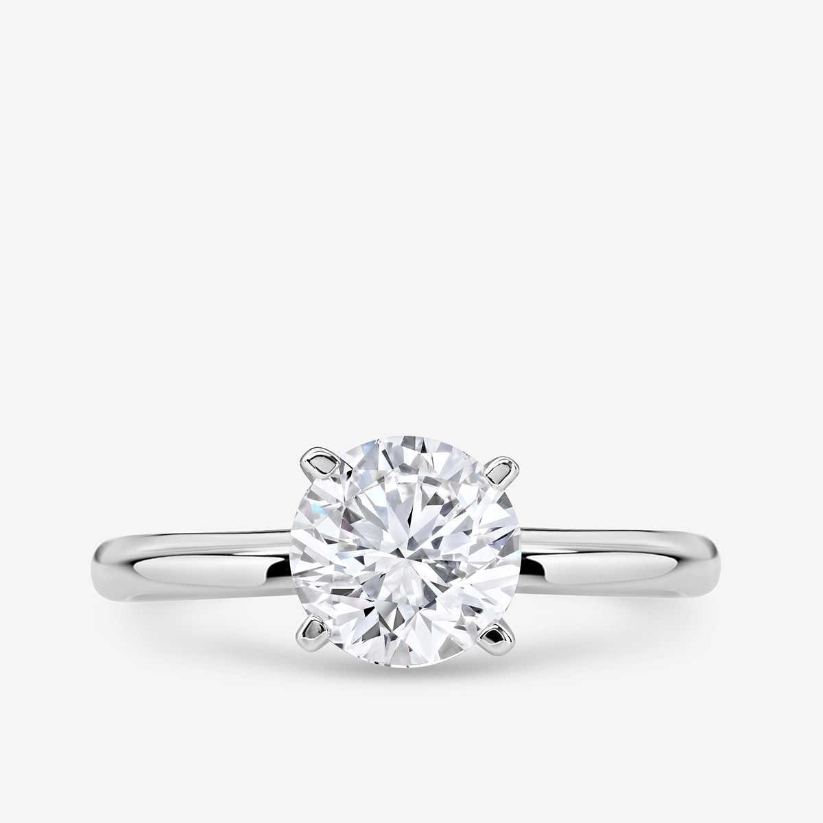 ELEGANT <span>Round Solitaire</span> RING