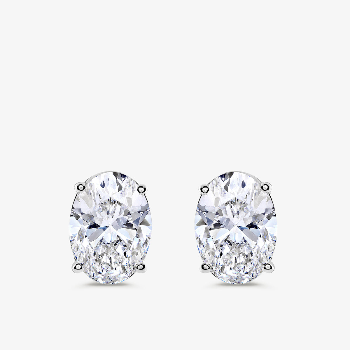 OVAL<span> Minimal Solitaire Stud </span>EARRINGS