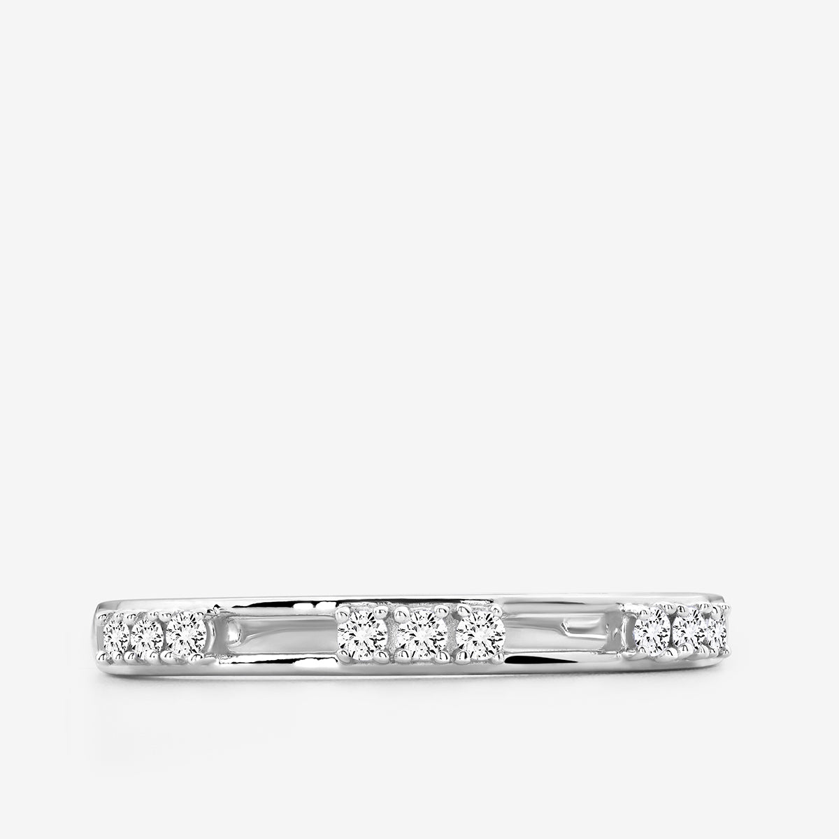 The MINIMAL Channel Set RING by Keemti Jewels features a slim silver band with clustered round diamonds and an air gap design.