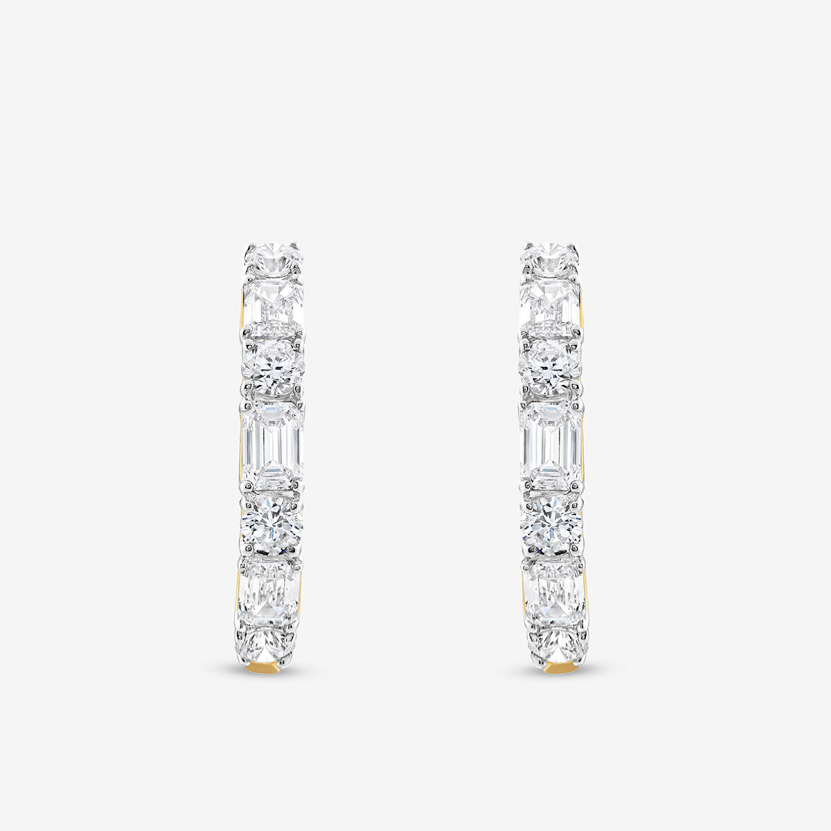Keemti Jewels’ SOFT Spark Huggie Earrings feature rectangular and round diamonds—timeless for everyday wear.