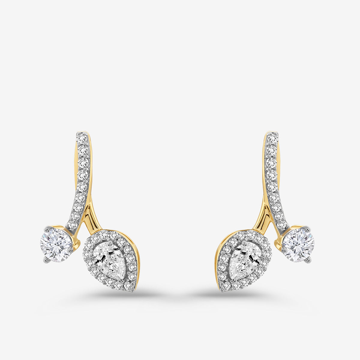 AURORA Station Hoop Earrings by Keemti Jewels feature pear and round diamonds in a modern curved design.