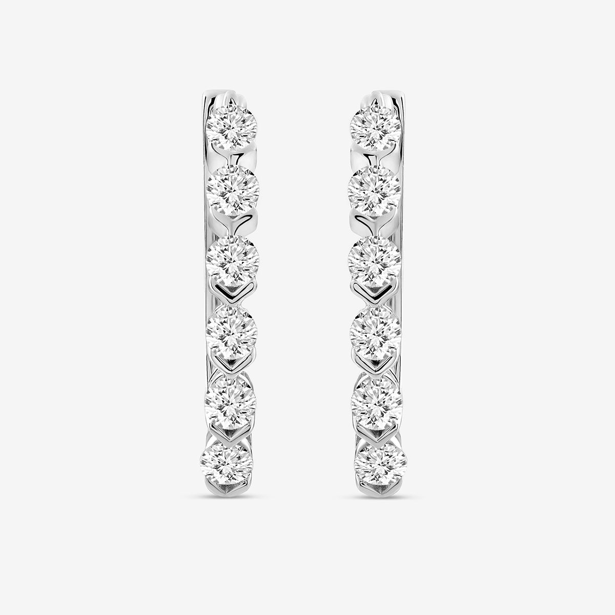 Vertical halo hoop earrings with five round stones, silver-tone finish, hoop profile