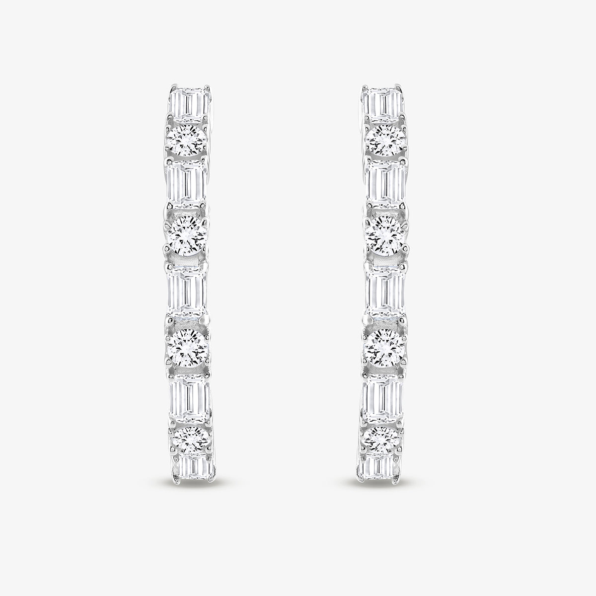 Keemti Jewels ORBIT shine huggie earrings feature white gold hoops with round and baguette diamonds, ideal for daily wear.