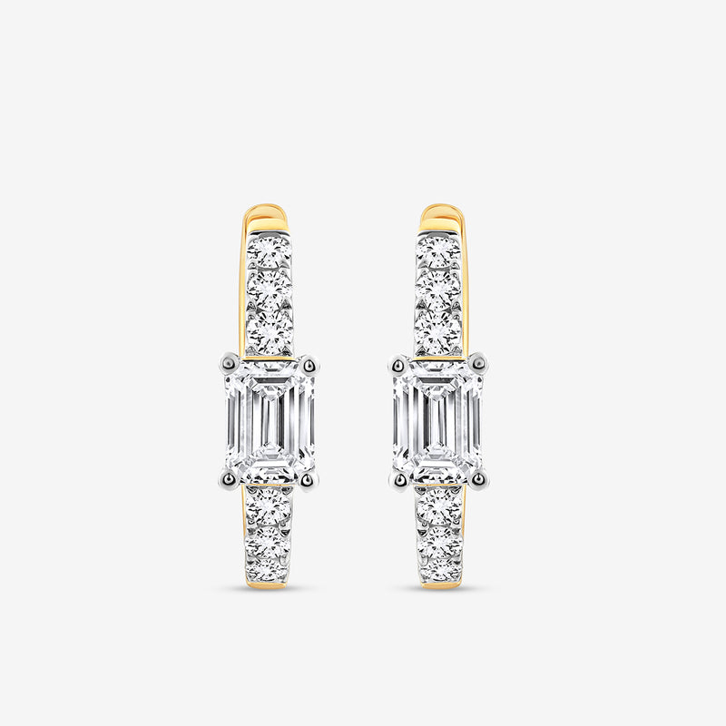 AERIS Emerald Huggie Earrings by Keemti Jewels feature baguette-cut centers and round diamonds on a white backdrop.