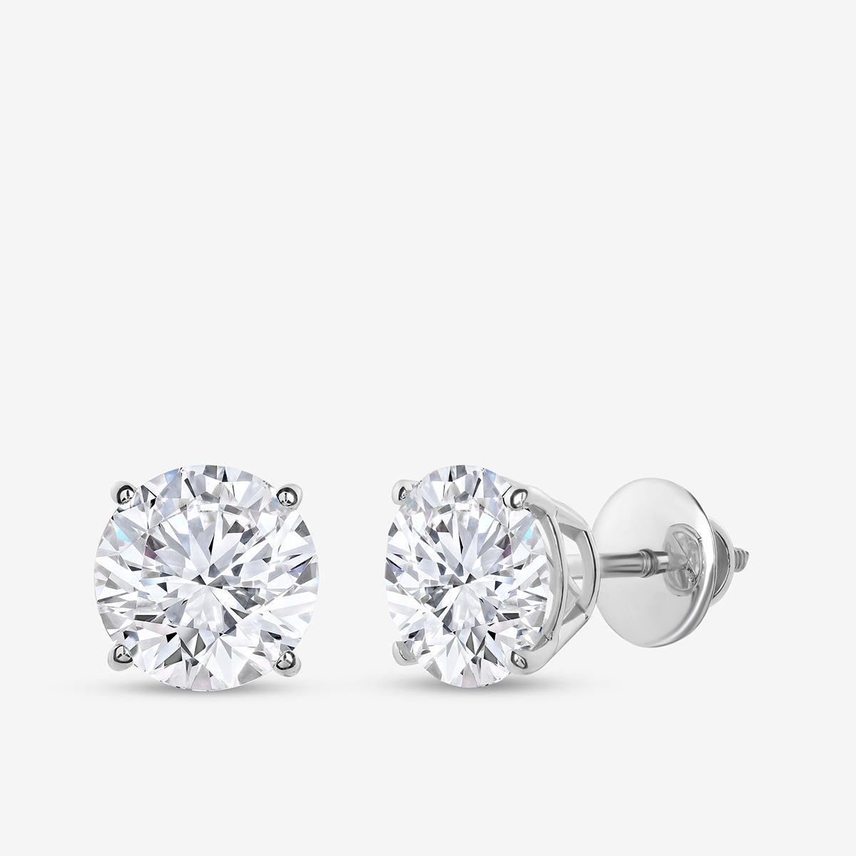 TIMELESS Solitaire Stud Earrings by Keemti Jewels feature brilliant-cut diamonds in a classic four-prong setting.