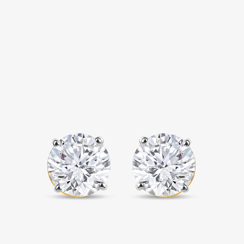 TIMELESS Solitaire Stud Earrings by Keemti Jewels feature sparkling stones in a classic four-prong setting.