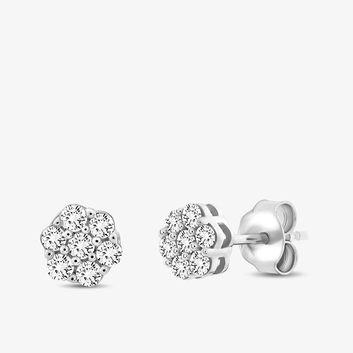 The CLASSIC Spark Stud EARRINGS by Keemti Jewels are silver, flower-shaped cluster earrings with layered diamonds in a sparkling floral design and classic butterfly backings.