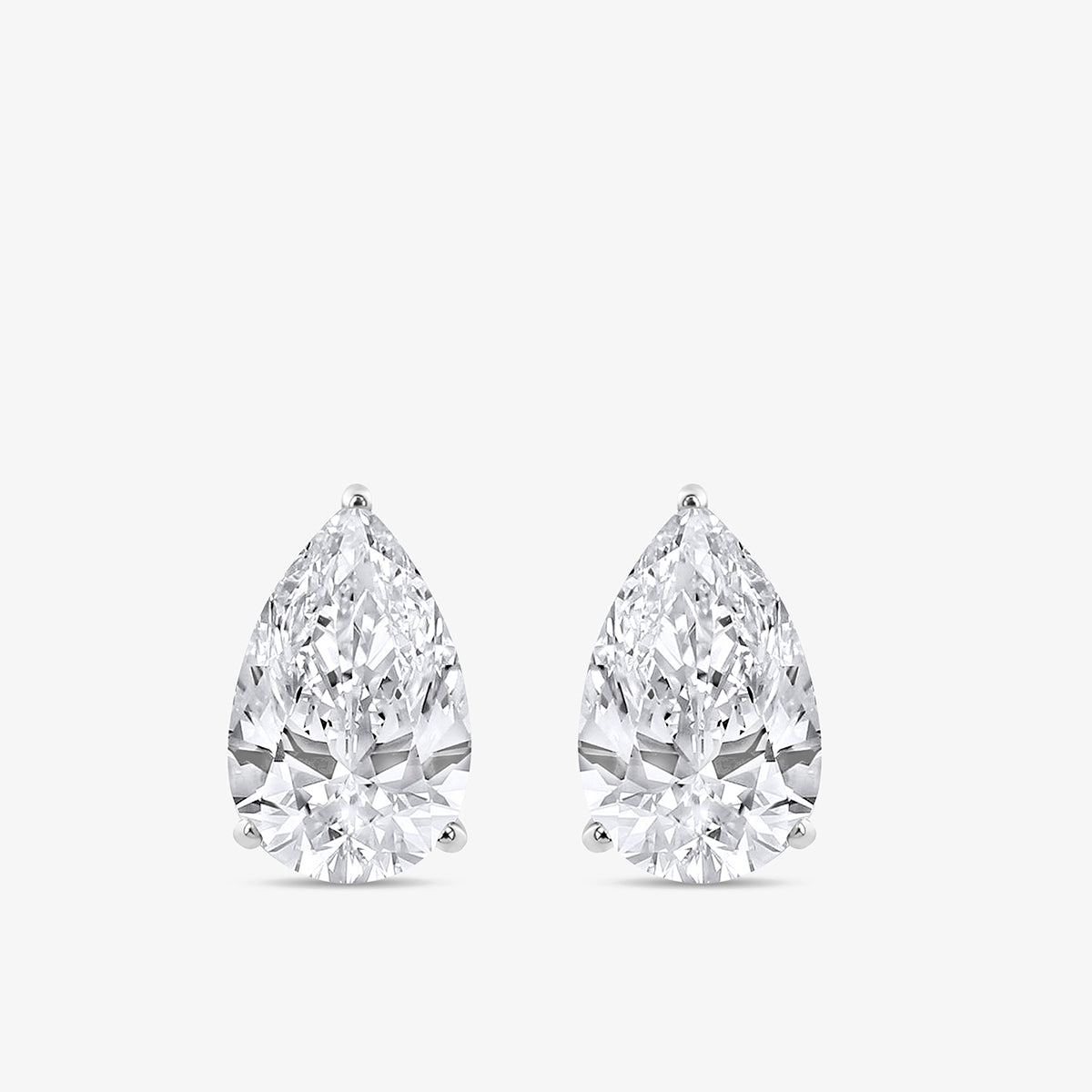 Keemti Jewels PEARLORIA Solitaire Stud Earrings feature sparkling pear-shaped stones in prong settings.