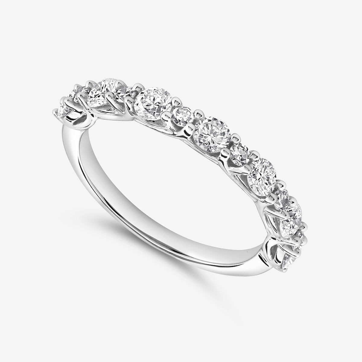 Keemti Jewels' GEOMETRIC Eternity RING: a white gold band with round diamonds and delicate patterns.