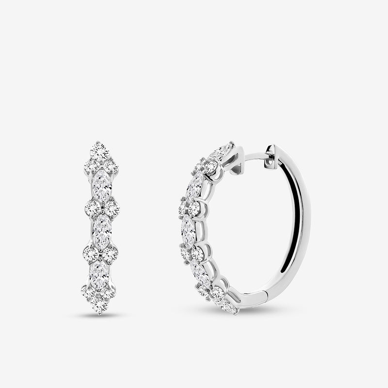 Keemti Jewels ELARA Shine Hoop Earrings: silver diamond hoops with a curved silhouette on a white background.