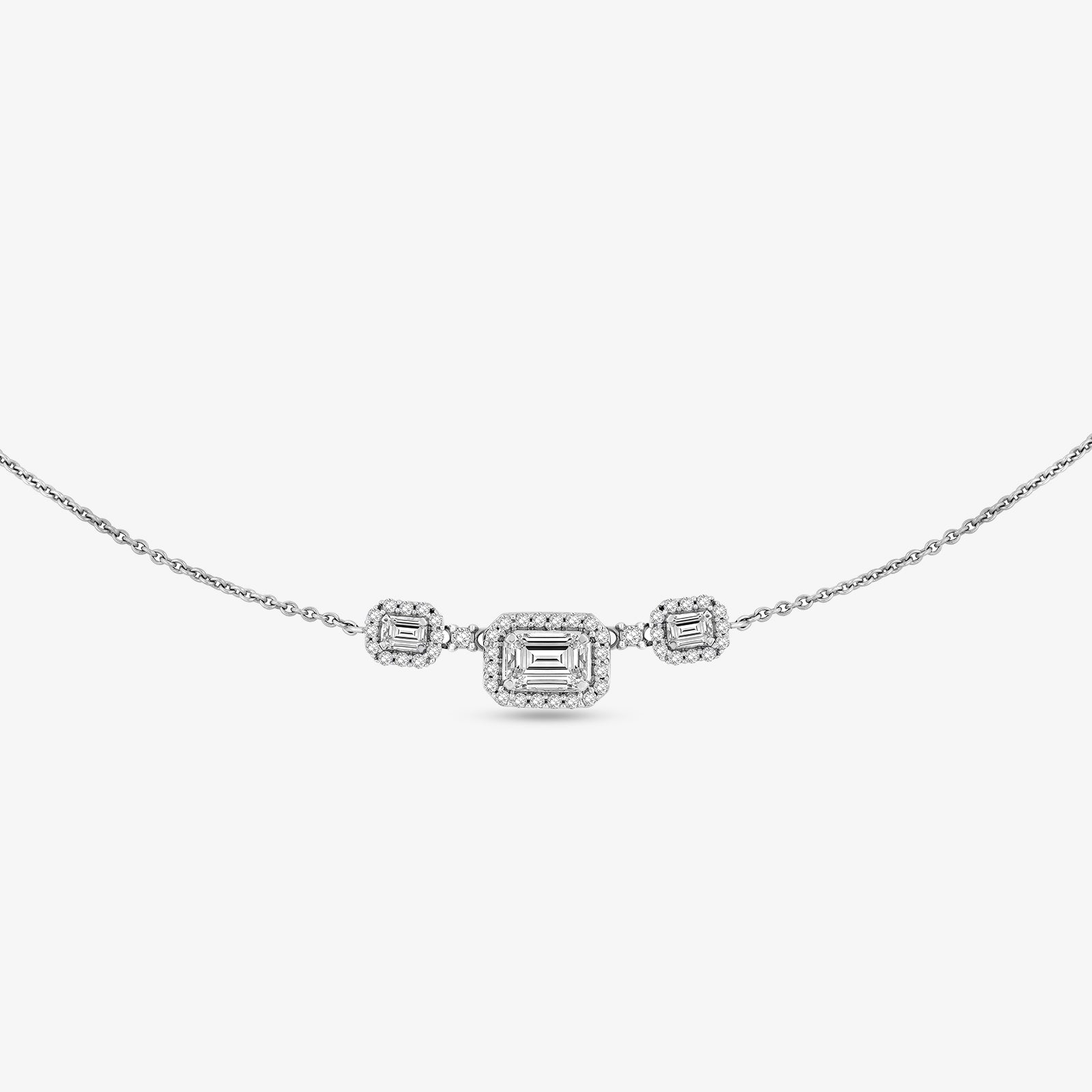 Geometric necklace with central emerald-cut stone and two smaller square side stones