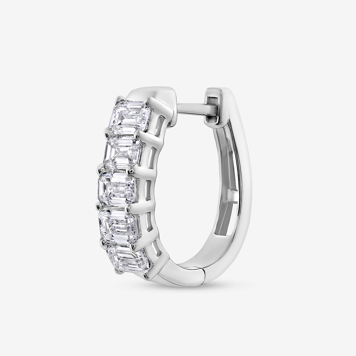 The ELYSIAN Hoop Earrings by Keemti Jewels feature five clear gemstones in a sleek channel setting for modern style.