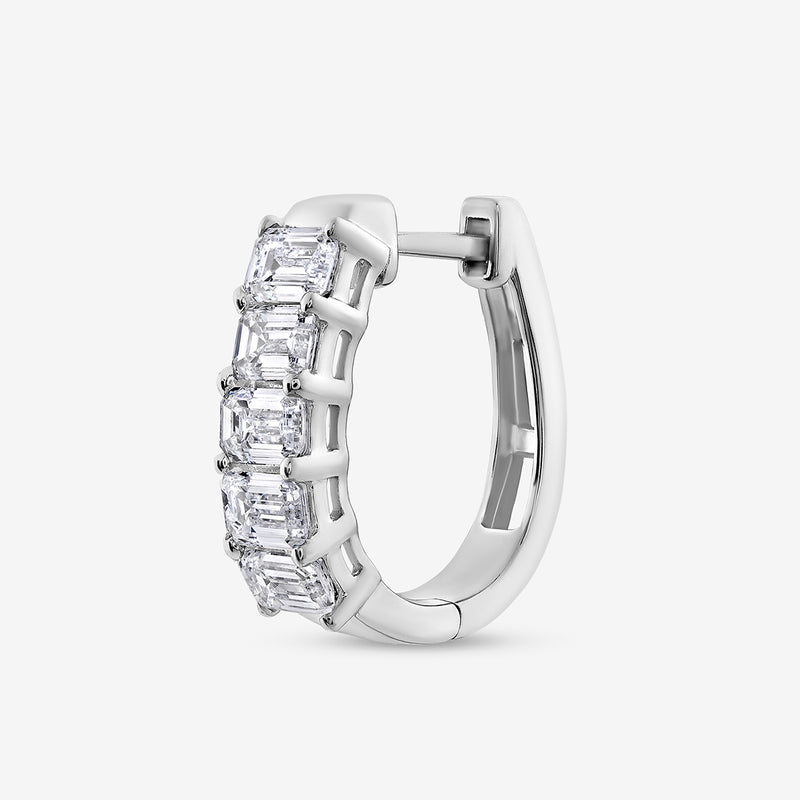 The ELYSIAN Hoop Earrings by Keemti Jewels feature five clear gemstones in a sleek channel setting for modern style.