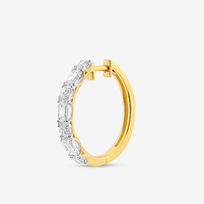 Keemti Jewels' SOFT Spark Huggie Earrings feature oval and emerald-cut clear stones—timeless for daily wear.
