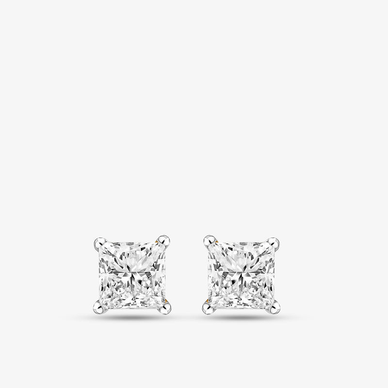 Keemti Jewels SQUARELUMIN Solitaire Stud Earrings with princess-cut diamonds and polished prongs on white background.
