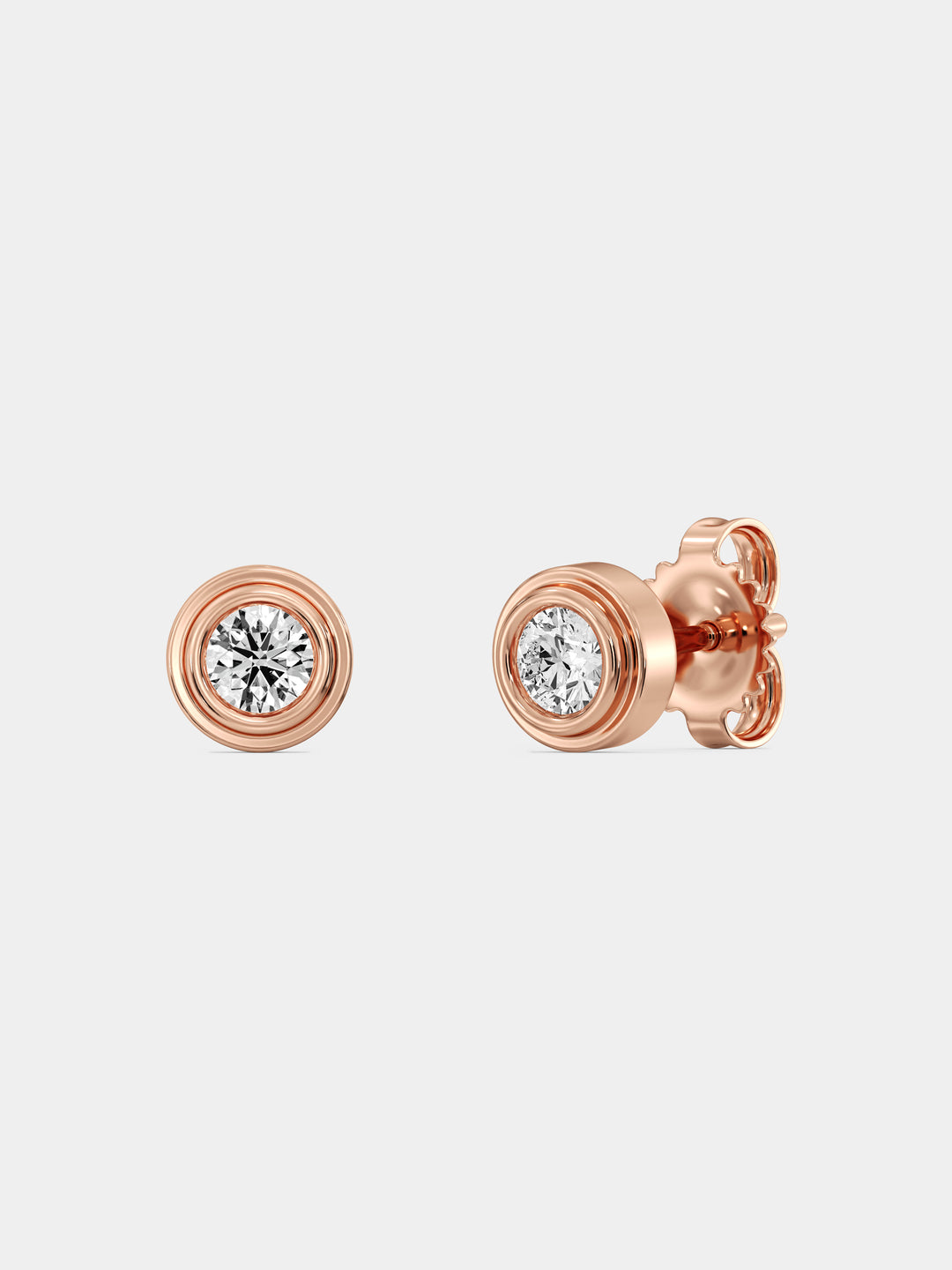 Keemti Jewels' Classic Bezel Stud Earrings offer modern minimalism and everyday elegance in rose gold.
