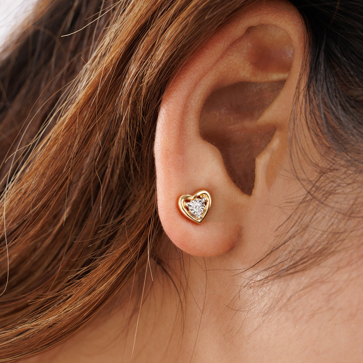 Keemti Jewels' Classic Heart-Shaped Diamond Earrings shine with timeless charm in this close-up shot.