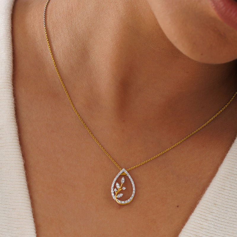 Keemti Jewels Teardrop Leaf Diamond Necklet: gold chain, leaf design, sparkling stones—unique style necklace.