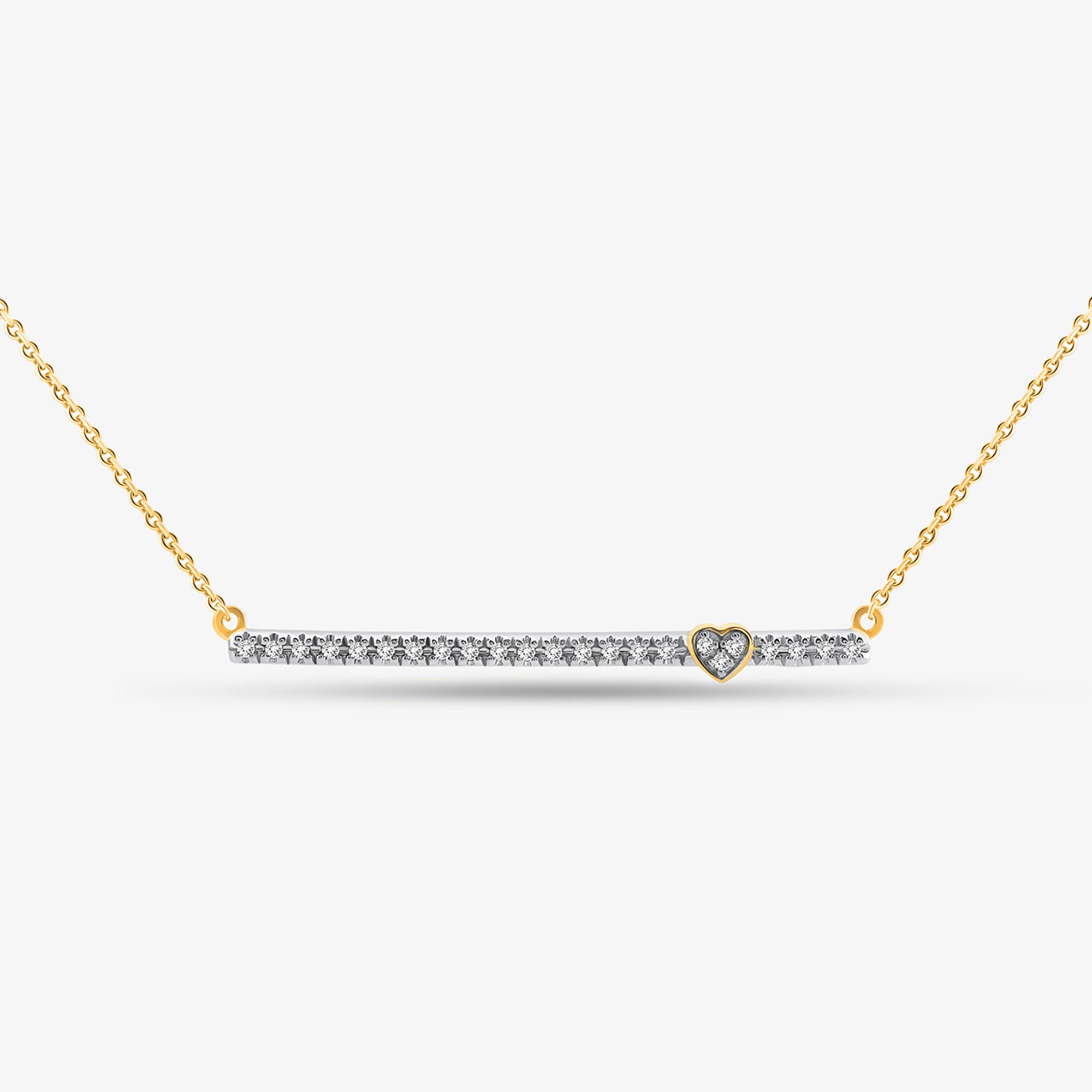 Keemti Jewels Linear Love Necklet: Gold bar chain necklace with heart motif, diamonds, on white background.