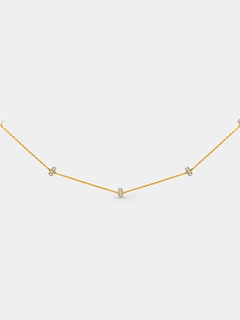 A woman wears the Grace Line Diamond Necklet by Keemti Jewels, its delicate chain ideal for everyday elegance.