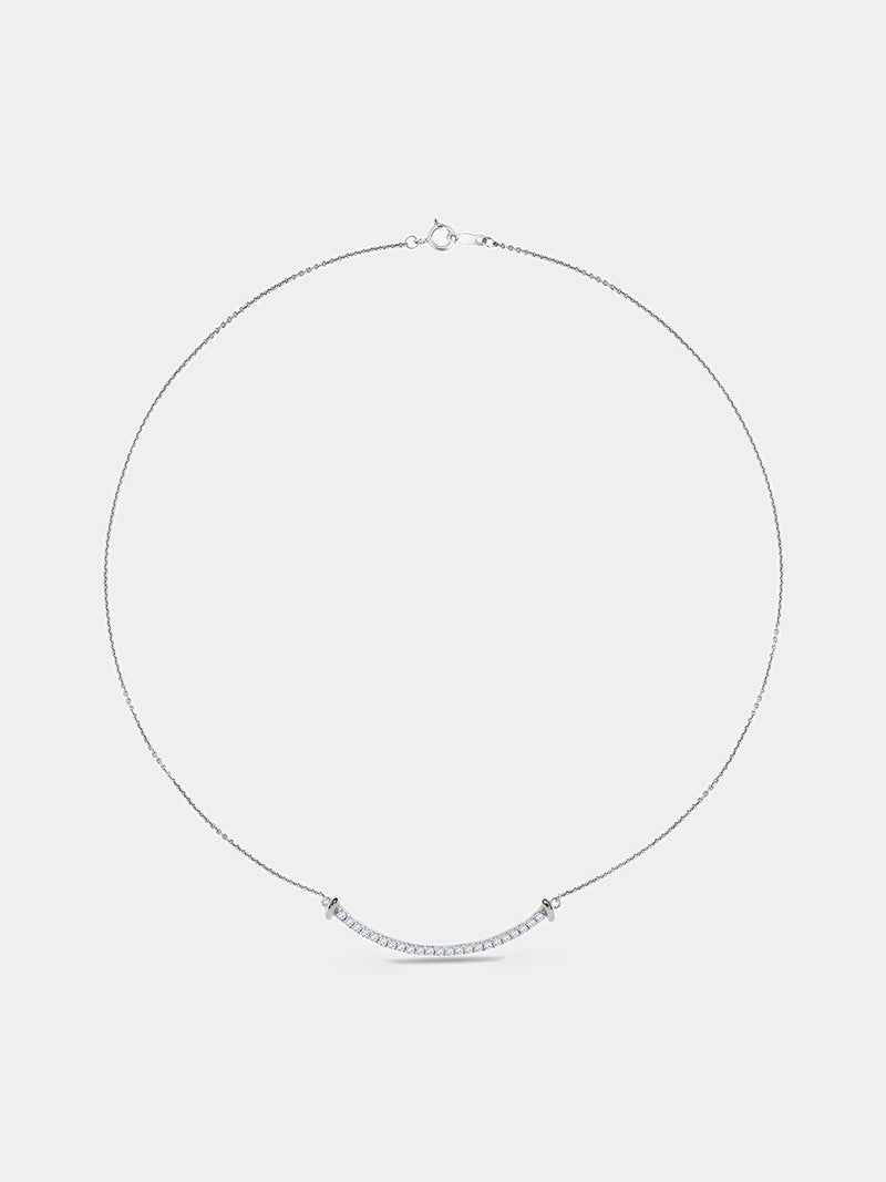 Aurelia Arc Necklet by Keemti Jewels: a sleek, thin-chain silver necklace with a curved bar pendant on white.