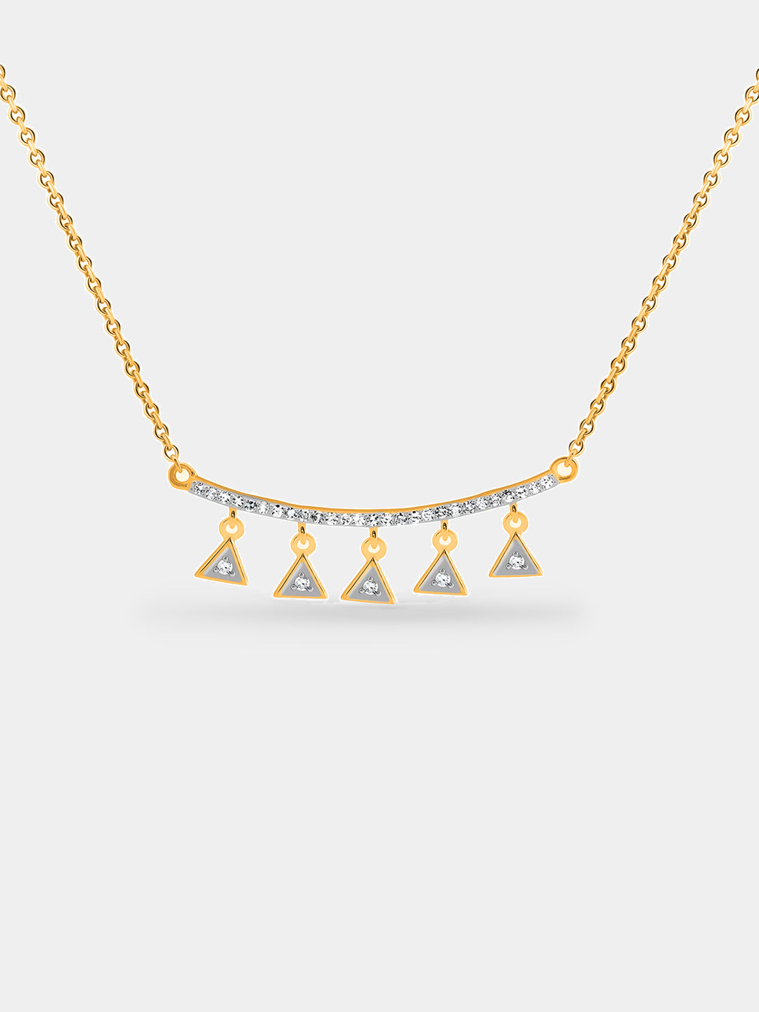 A woman in a dark collared shirt wears Keemti Jewels' Triangle Charm Drop Necklet with geometric pendants.