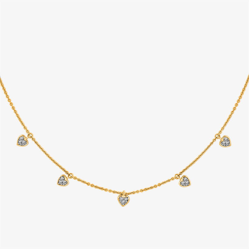 Linked heart charm necklace with small heart pendants and a center heart, silver 925