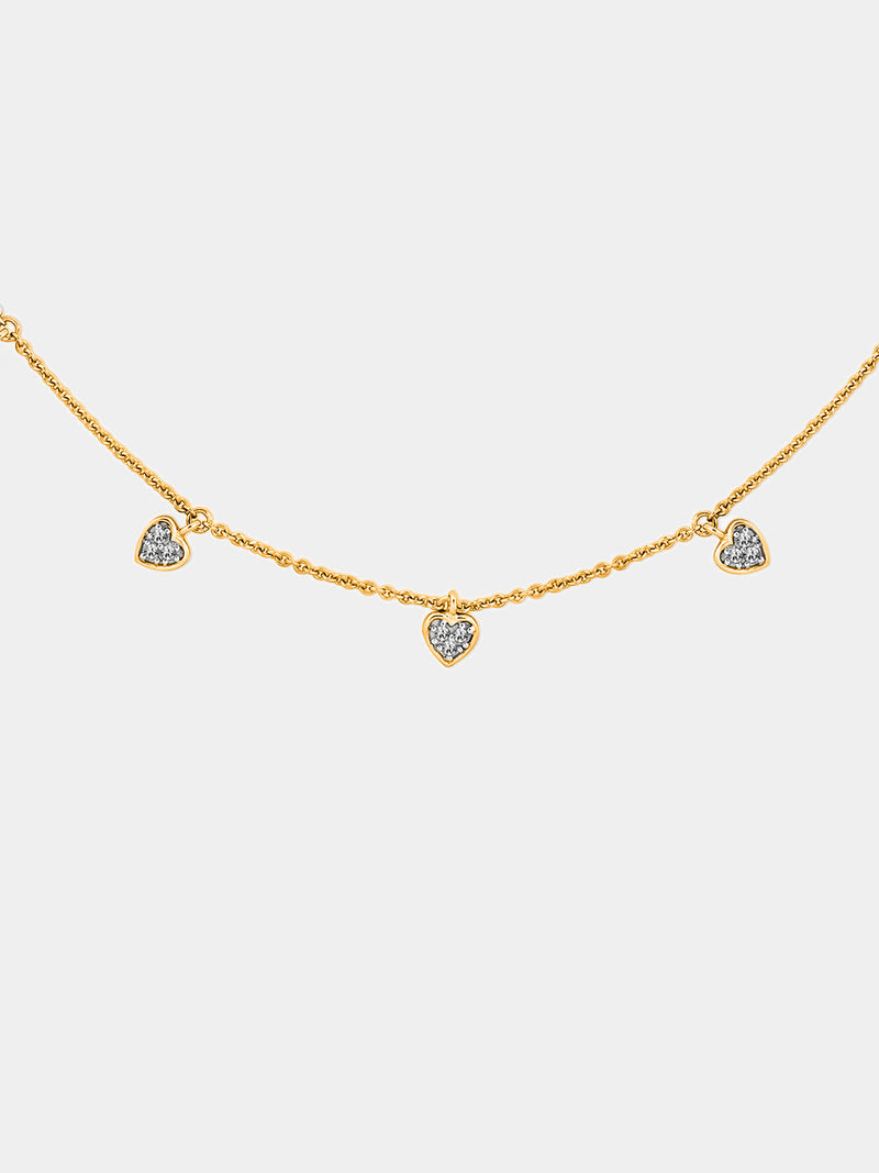 Keemti Jewels Linked By Love Charm Necklet: three heart charms with clear stones on a fine gold chain.