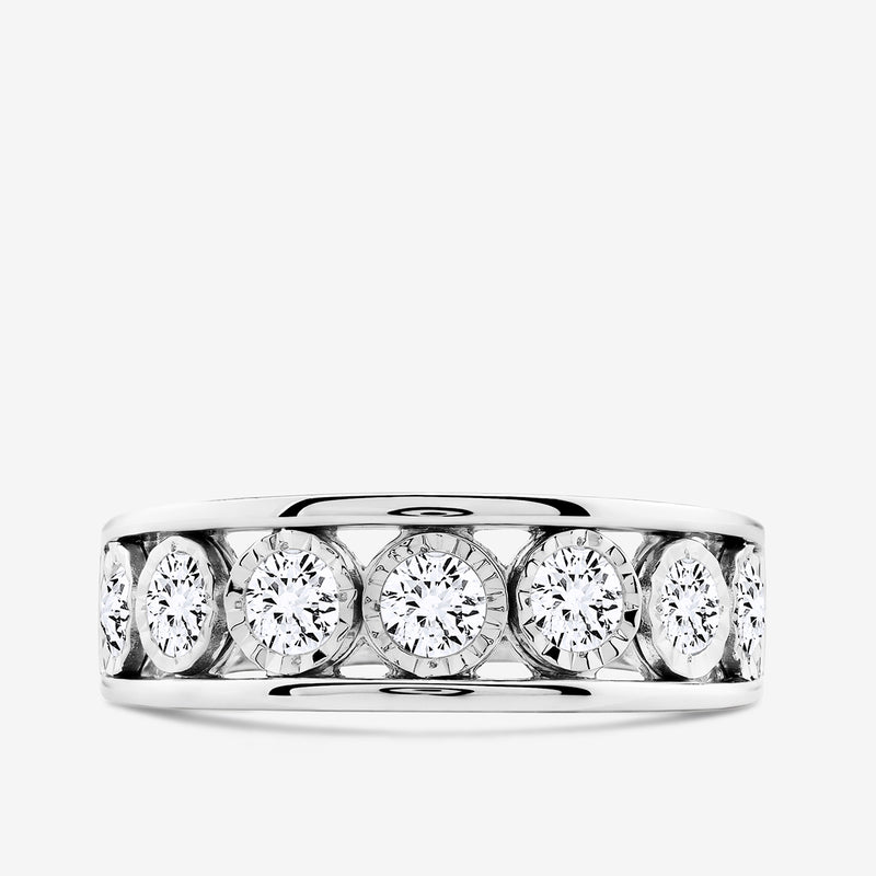 Bezel ring in silver vermeil plating with five round stones across the band
