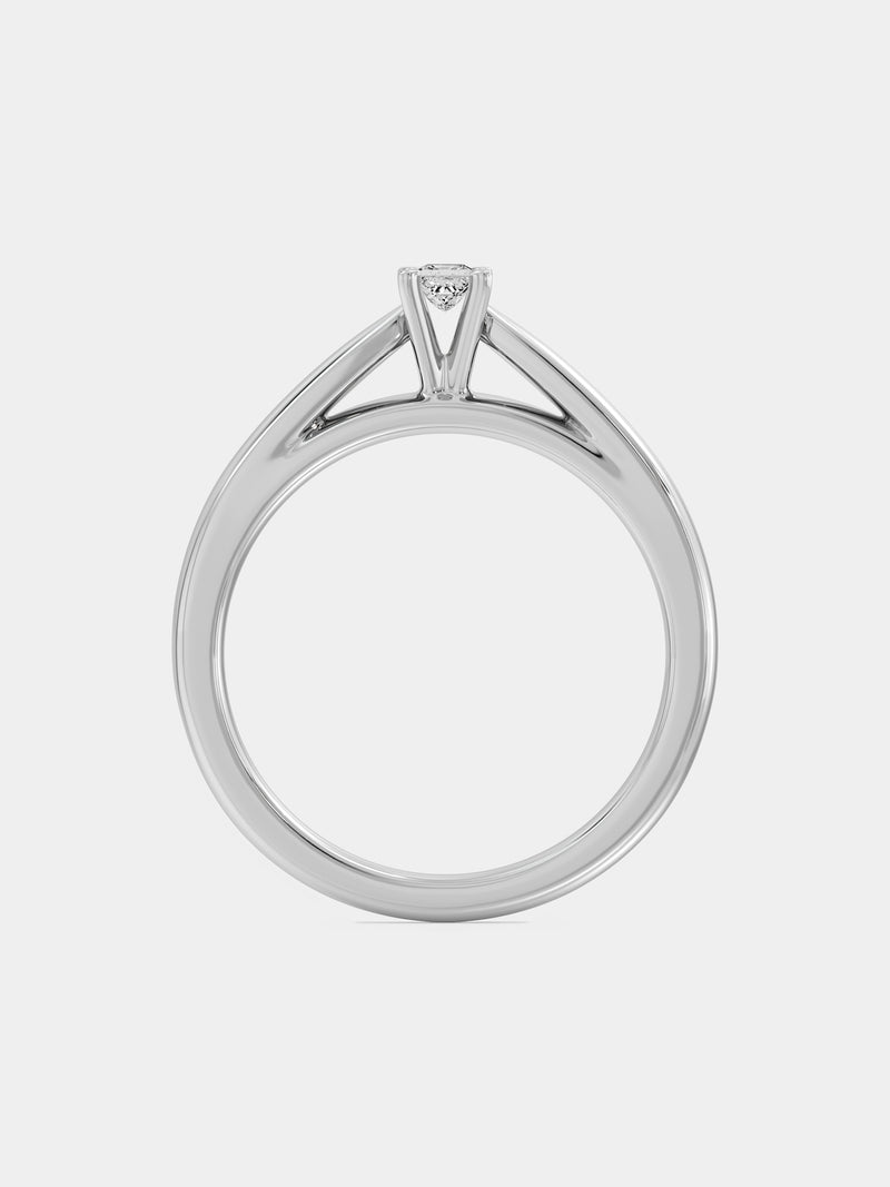 Top view of princess-cut diamond ring with central stone in four-prong setting, silver-tone