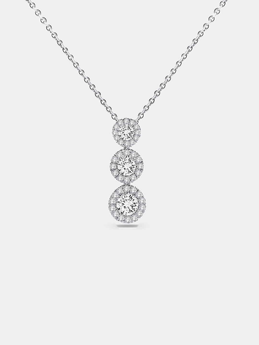 Silver 925 three-stone halo necklet: three round stones on fine link chain.