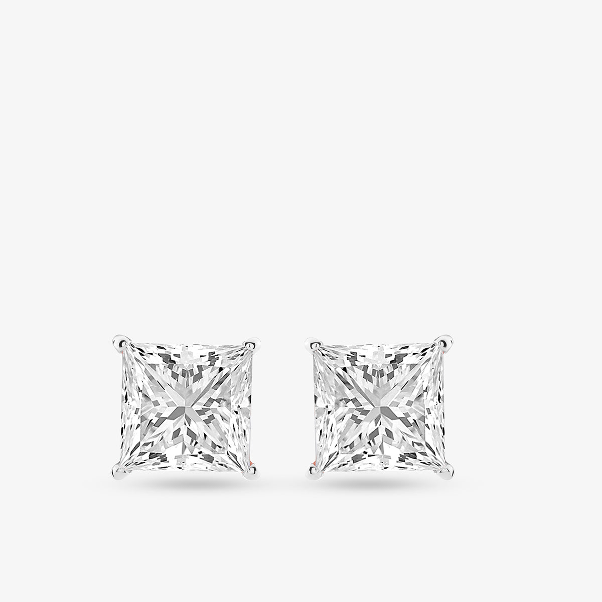 Keemti Jewels PRINCESS Solitaire Stud EARRINGS with princess-cut diamonds in white metal on a plain background.