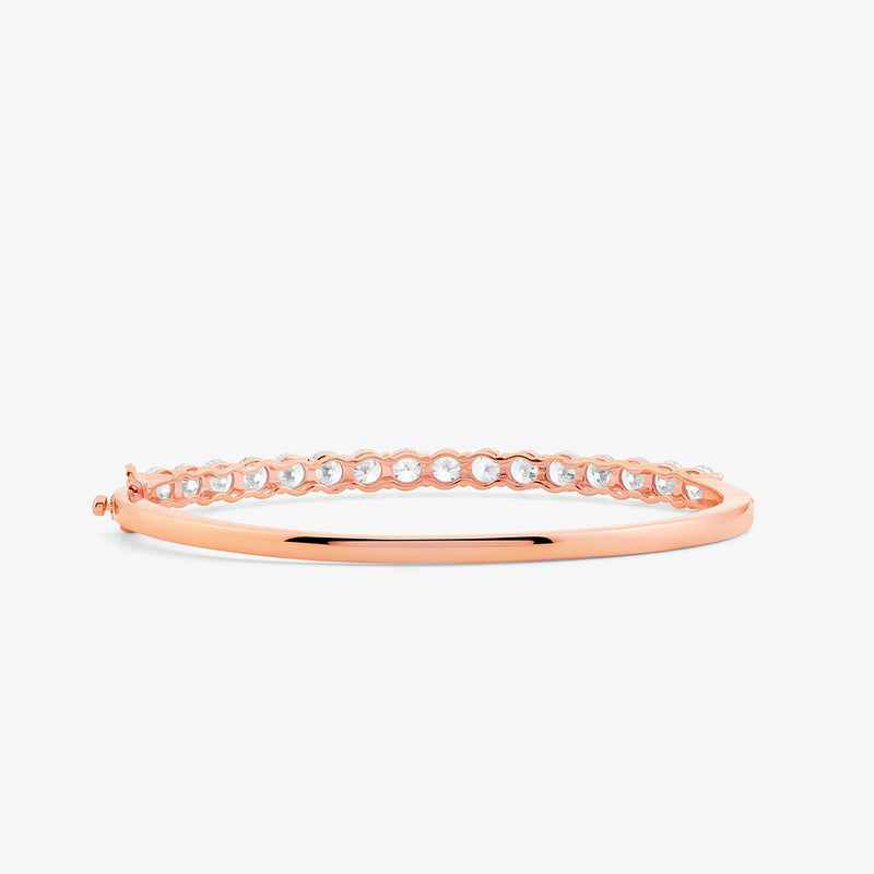 The Dewkiss Oval Diamond Bracelet by Keemti Jewels features sparkling stones in a timeless rose gold design.