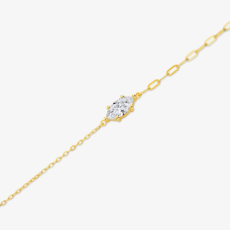 Keemti Jewels' Marquise Diamond Chain Bracelet features a gold chain and marquise-cut diamond on a white background.