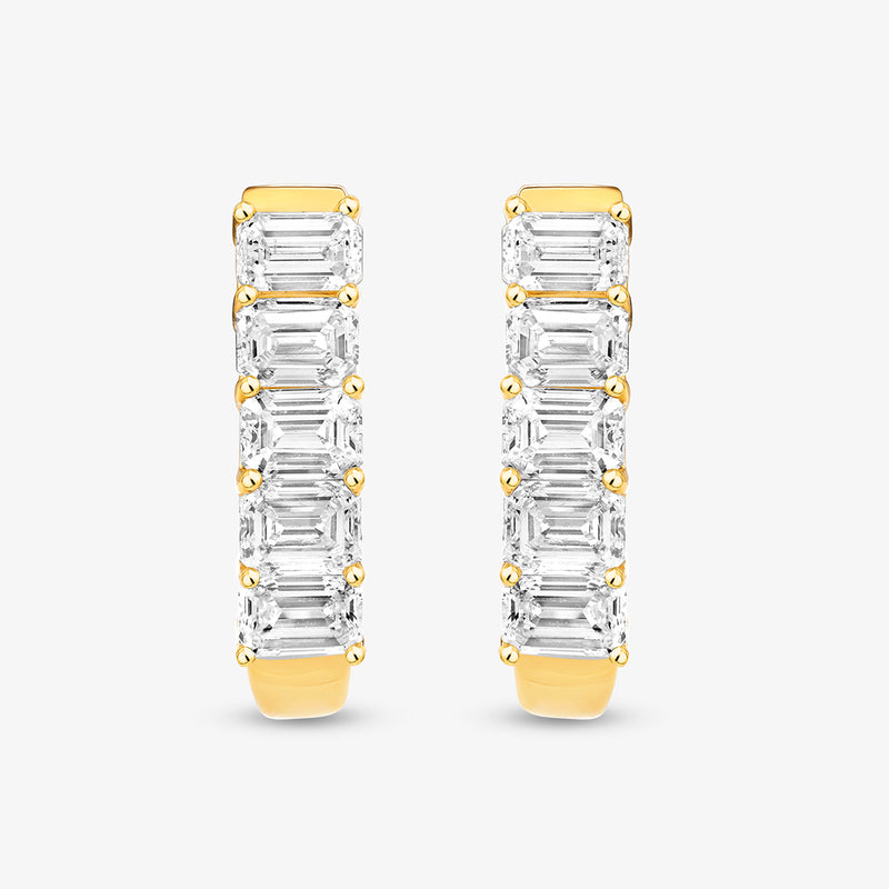 Keemti Jewels' Radiant Grid Huggie Diamond Earrings feature five emerald-cut diamonds in a modern style.