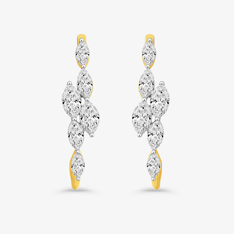 Keemti Jewels’ Marquise Cascade Diamond Drop Earrings feature round and marquise diamonds in a linear design.