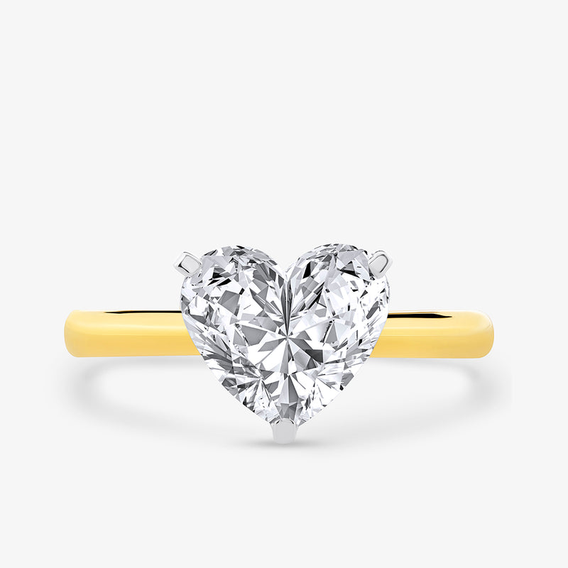 Keemti Jewels' Essential Heart Solitaire Ring features a gold band and heart diamond—ideal romantic jewelry for any occasion.