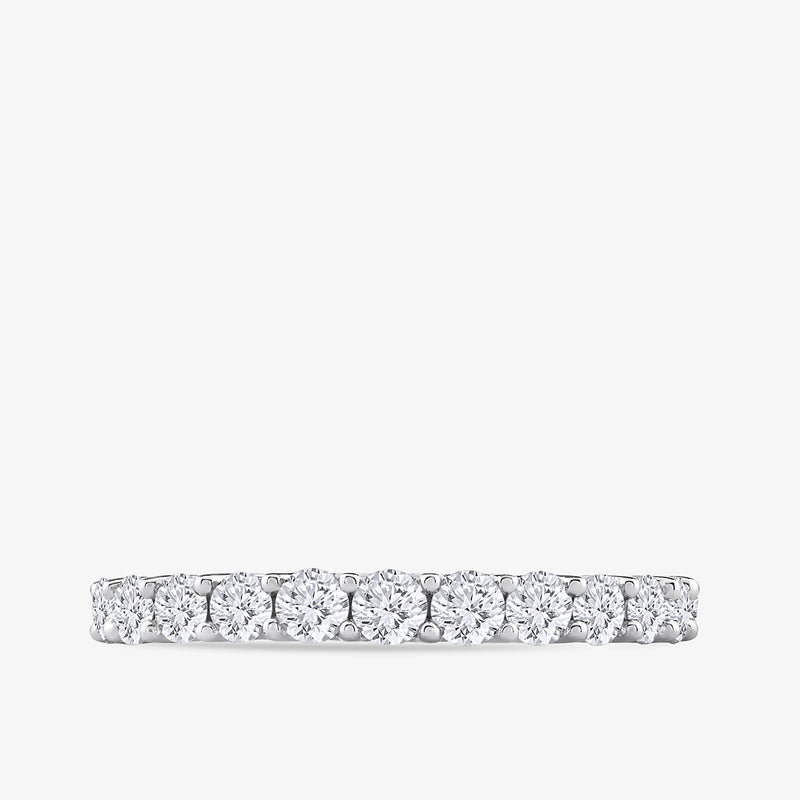 Keemti Jewels Round Cluster Eternity Diamond Ring in white gold with a row of sparkling diamonds on a plain background.