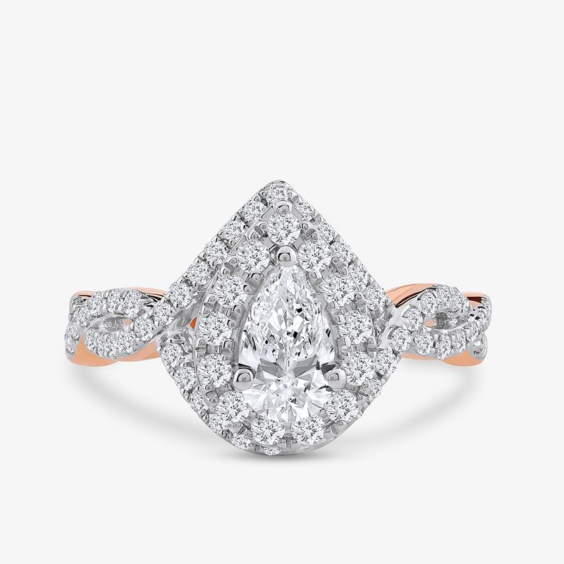 The Keemti Jewels Rose Dewdrop Diamond Bridal Ring features a pear-cut center, double halo, and twisted rose gold band.