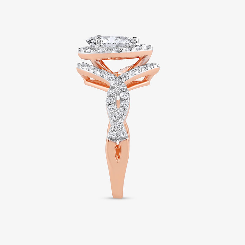 Keemti Jewels' Rose Dewdrop Diamond Bridal Ring features a marquise center and intertwined diamond band in rose gold.