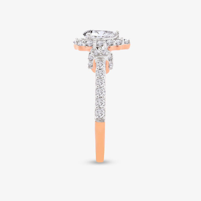 The Dewdrop Bloom Diamond Promise Ring by Keemti Jewels features rose gold, silver, and a pear-shaped diamond side view.