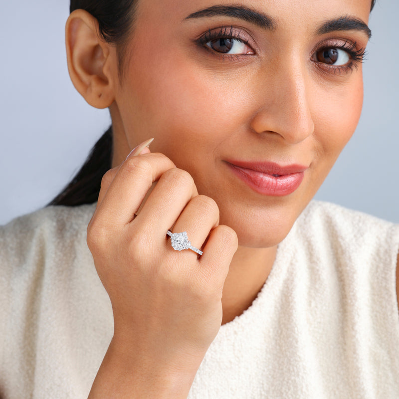 Woman smiling softly, displaying the Dewdrop Bloom Diamond Promise Ring by Keemti Jewels on her hand.