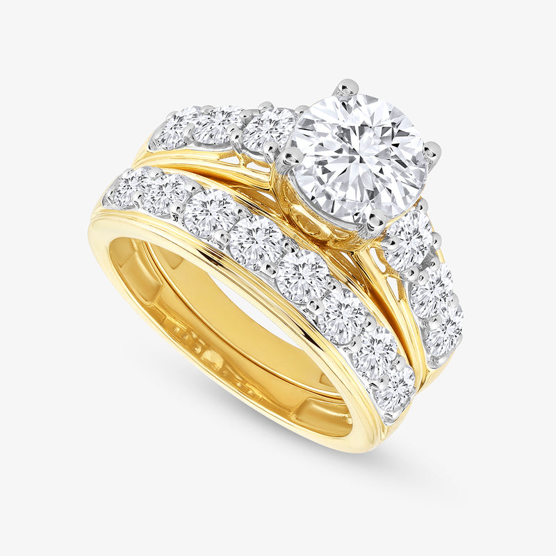 Keemti Jewels Endless Glow Solitaire Ring with a large round diamond and diamond-set band on a white background.