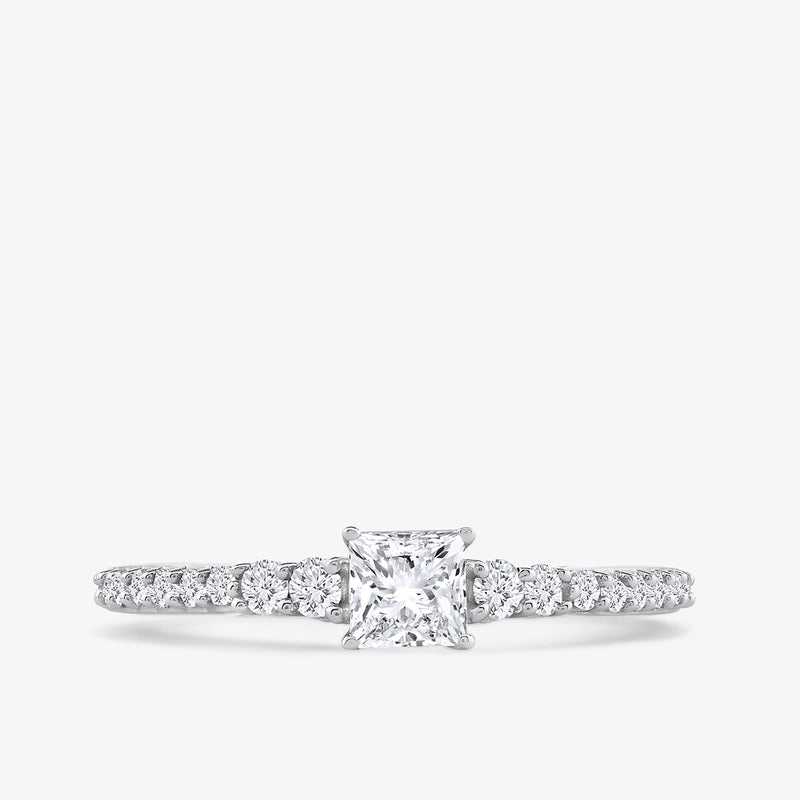 The Keemti Jewels Timeless Princess Glow Ring features a princess-cut diamond and diamond accents on white gold.