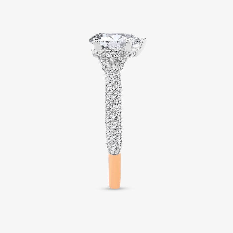 Side view of Keemti Jewels’ Eternal Emerald Solitaire Ring with pave band, emerald-cut diamond, and rose gold at the base.