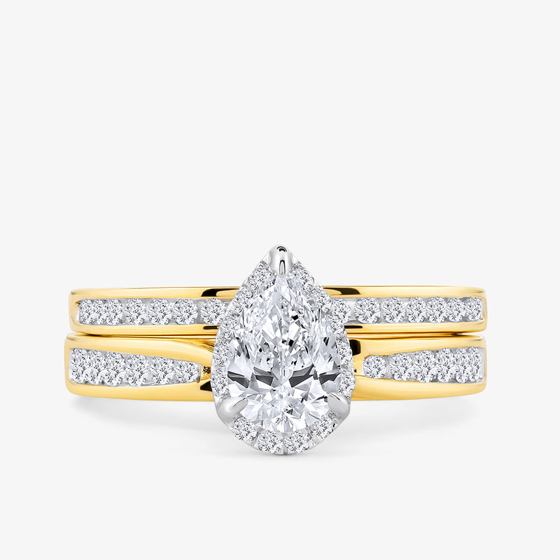 The Keemti Jewels Soft Glow Pear Diamond Solitaire Ring features a gold band with pavé accents, shown on white background.