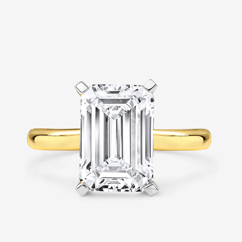 Keemti Jewels CLASSIC Emerald Solitaire RING features a gold band and prong setting for stunning brilliance.