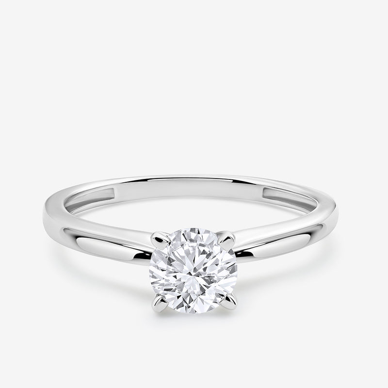 The ELEGANT Round Solitaire RING by Keemti Jewels showcases a round center diamond in a four-prong silver setting.