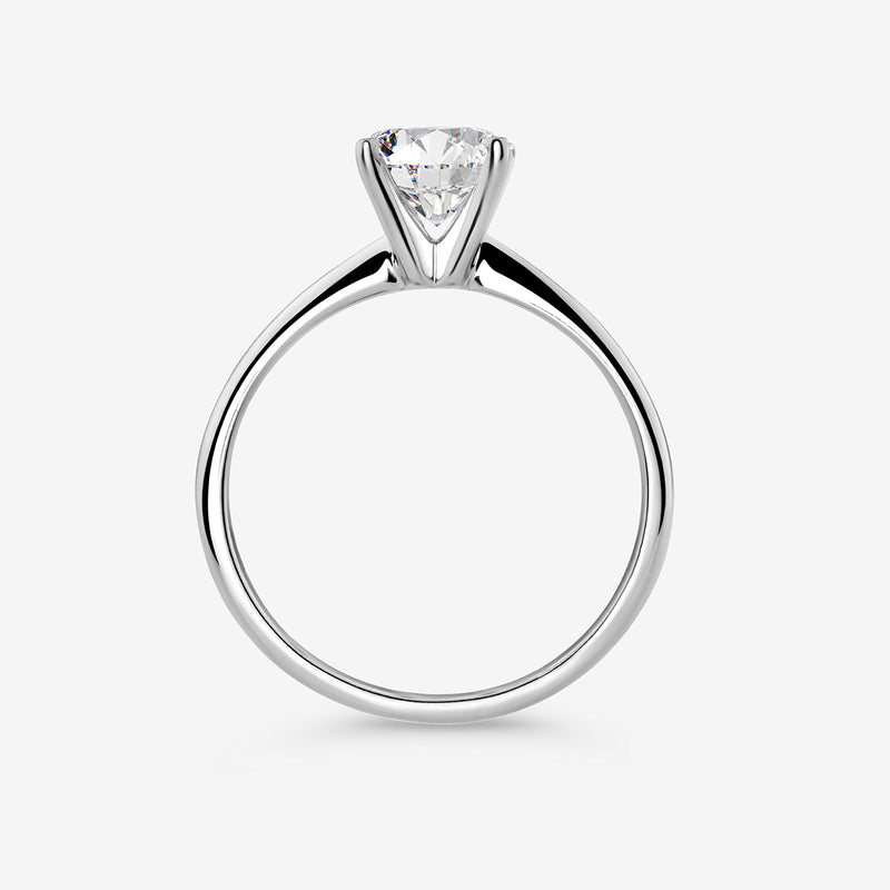 The ELEGANT Round Solitaire RING by Keemti Jewels features a round-cut center on a sleek white gold band.