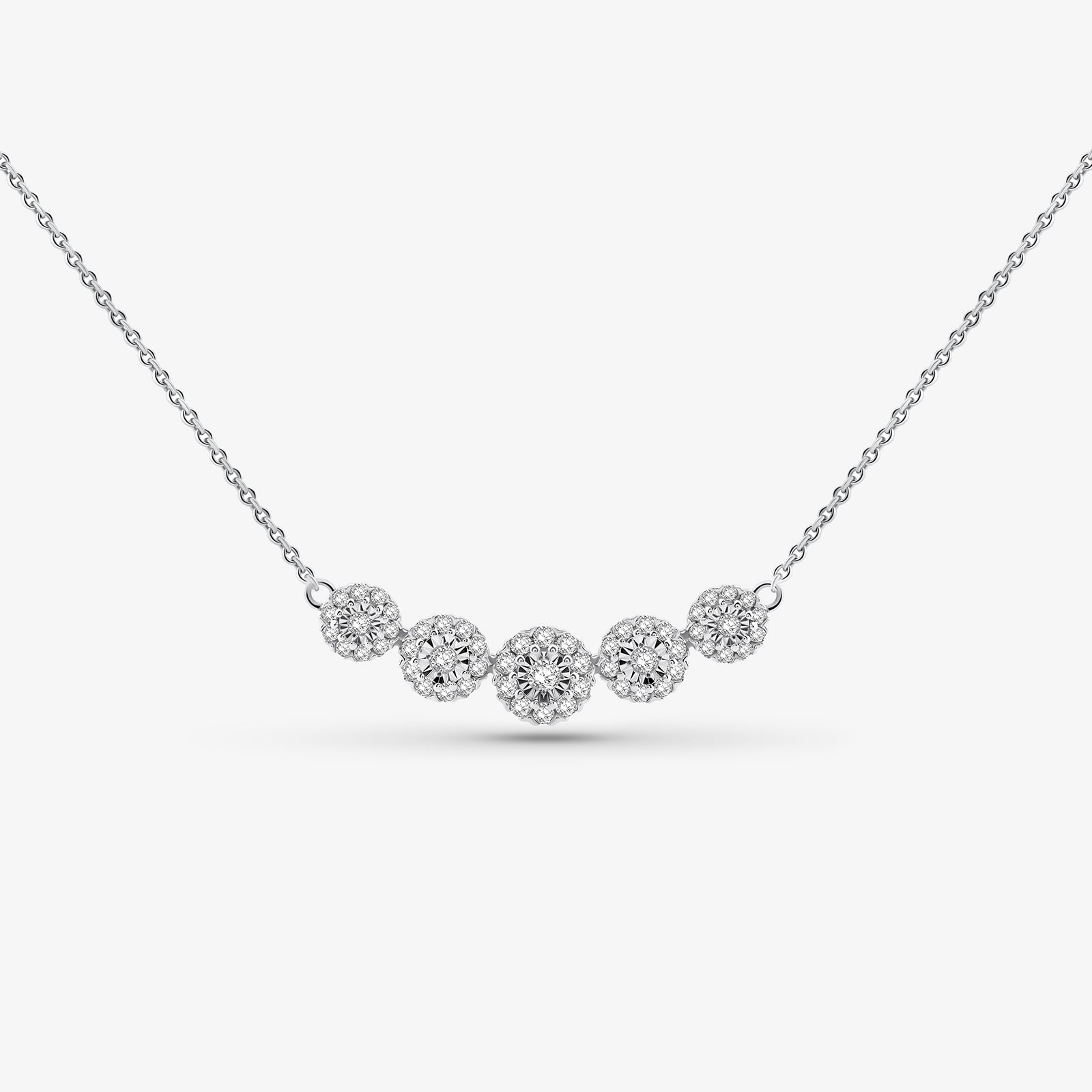 Silver-tone floral cluster necklace with round sparkling stone clusters
